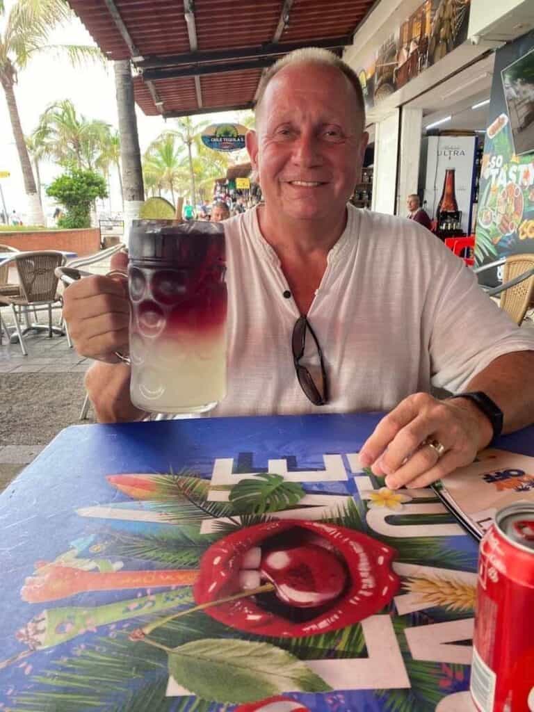 Me lifting a glass of Sangria at a mexican restaurant.
