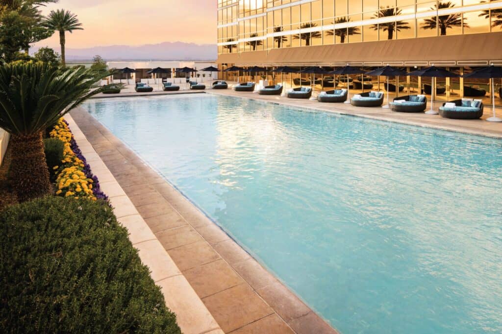Trump International Hotel pool with daybeds around the pool's edges.