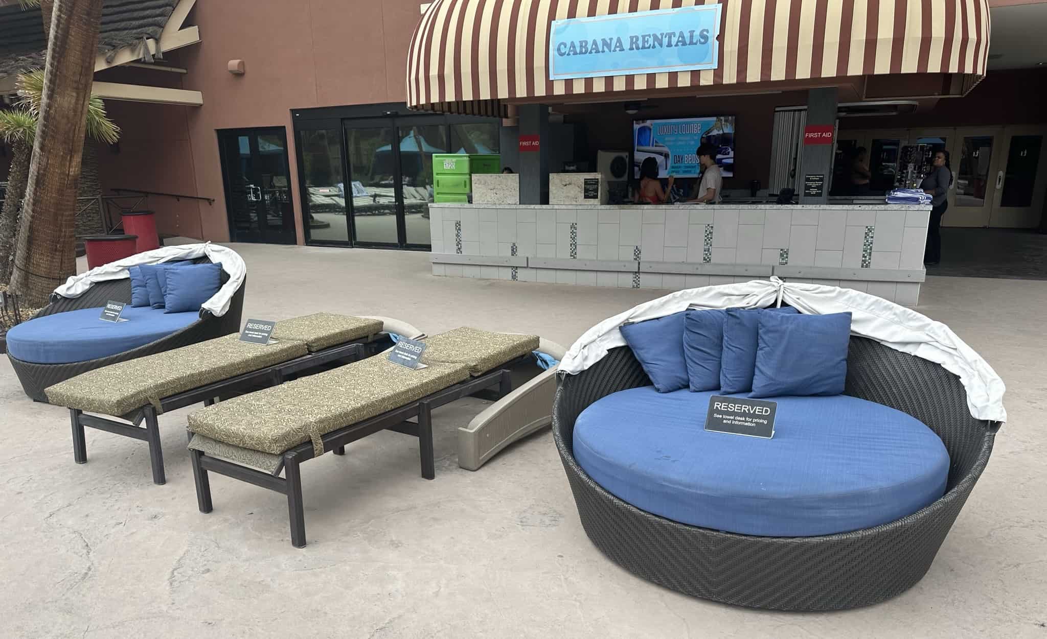 2 Treasure Island blue luxury daybeds with 2 luxury loungers between them.