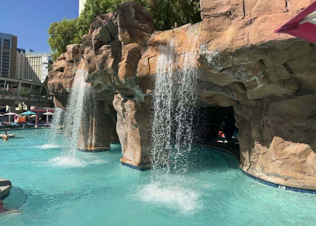 Cascading waterfalls pour water into the Go Pool.